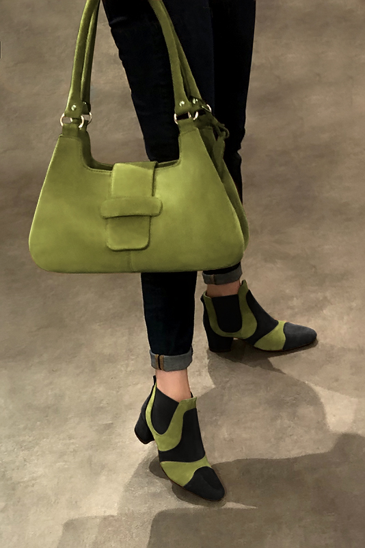 Matt black and pistachio green women's ankle boots, with elastics. Round toe. Low flare heels. Worn view - Florence KOOIJMAN